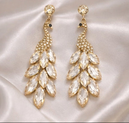 Collage of women wearing gold earrings with close-ups of the jewelry.