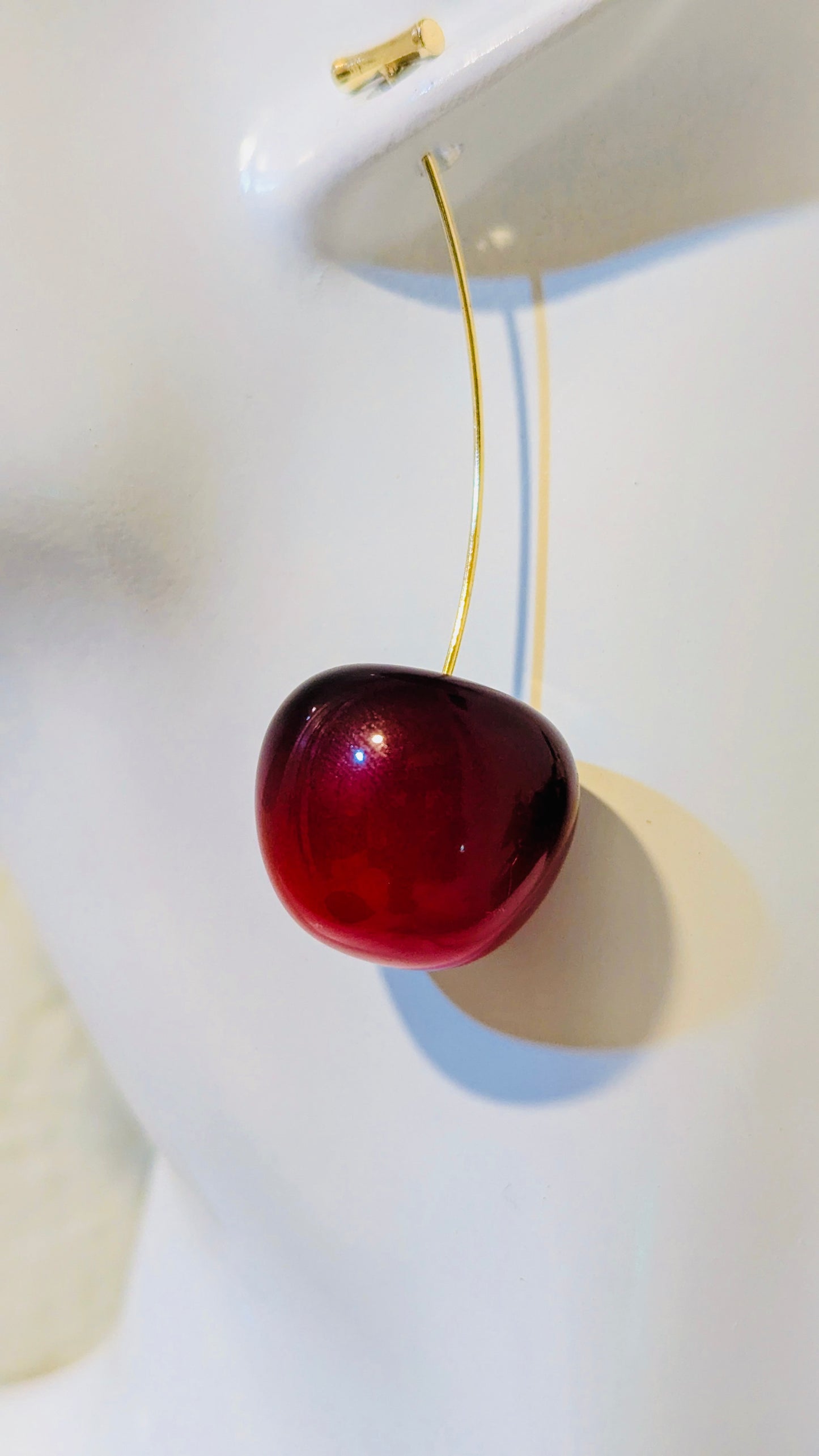 Red cherry on a white background