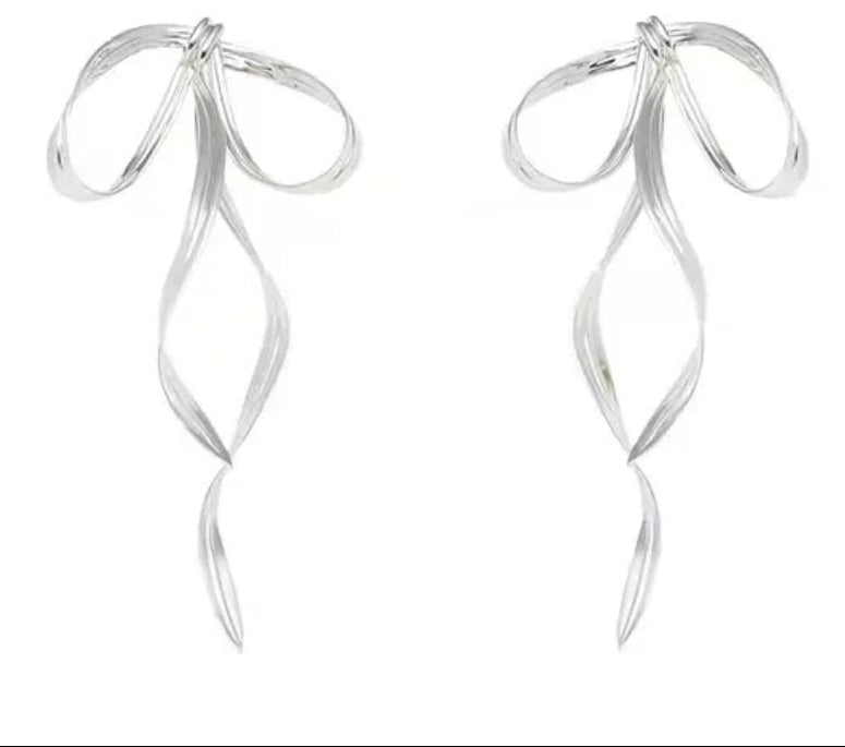 Silver earrings with a ribbon design on a white background