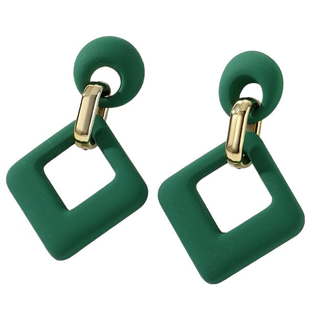 A pair of green velvet rhombus-shaped earrings with gold clip attachments, displayed against a white background.