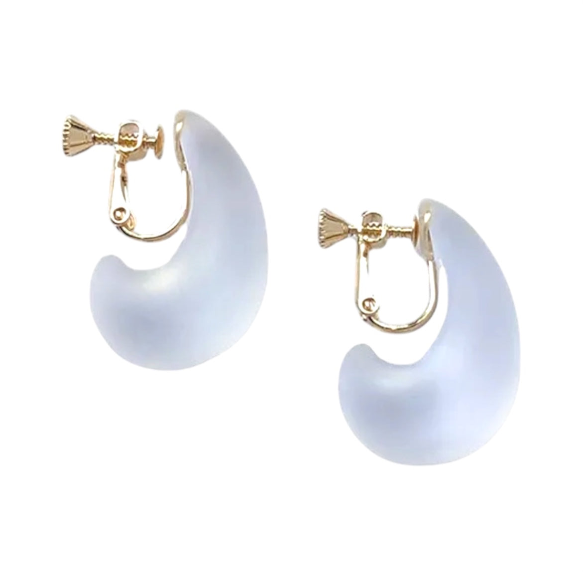 Pair of white hoop earrings with gold accents on a white background