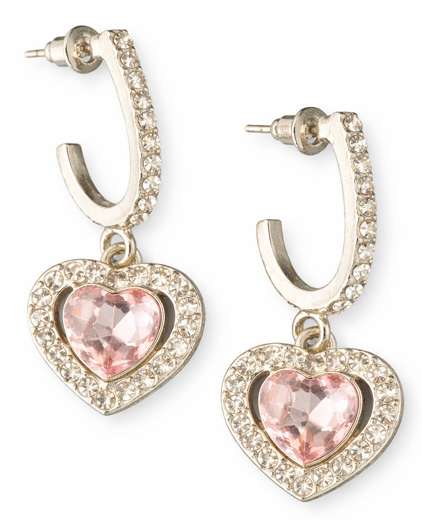 Heart-shaped earrings with pink gemstones on a white background