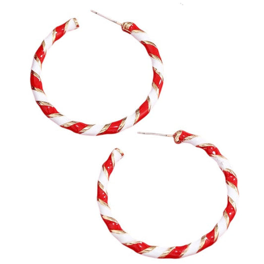 Red and white striped hoop earrings on a white background