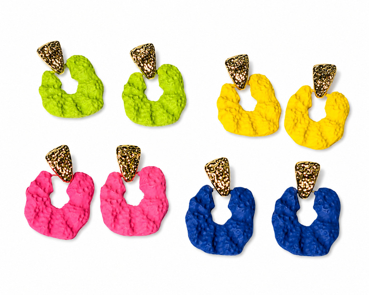 Set of colorful earrings with textured design on a white background