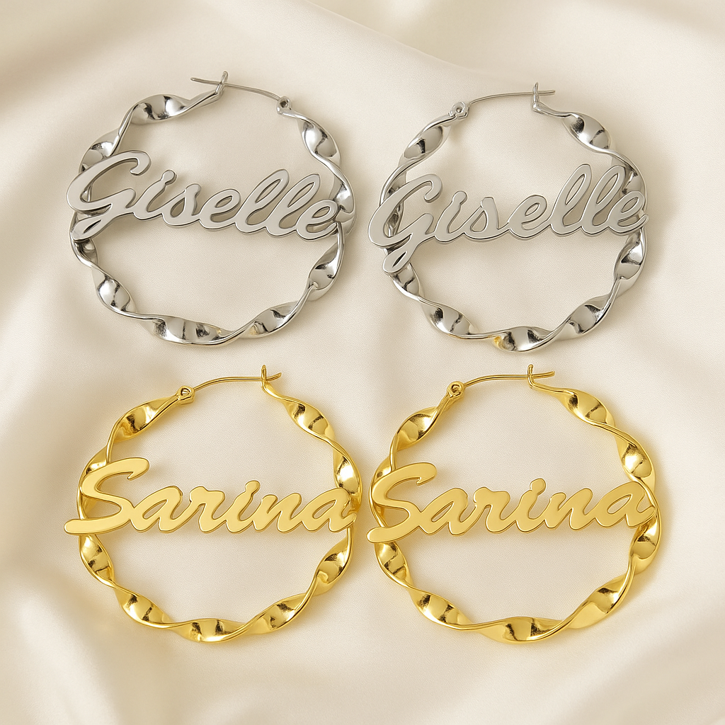 Pair of silver 'Giselle' hoop earrings and pair of gold 'Sarina' hoop earrings on a light background.