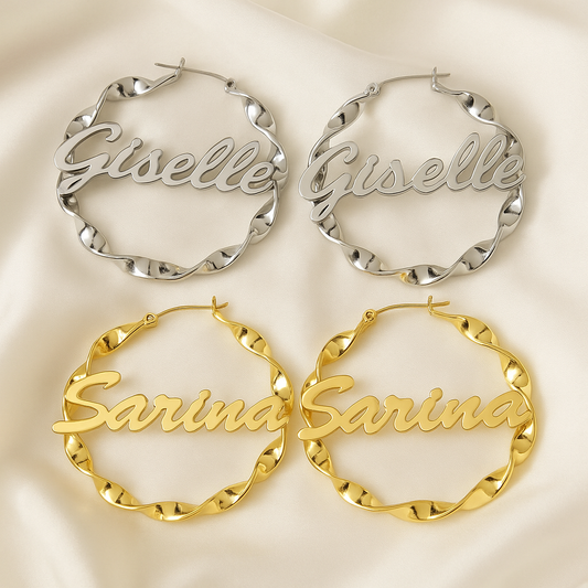 Pair of silver 'Giselle' hoop earrings and pair of gold 'Sarina' hoop earrings on a light background.