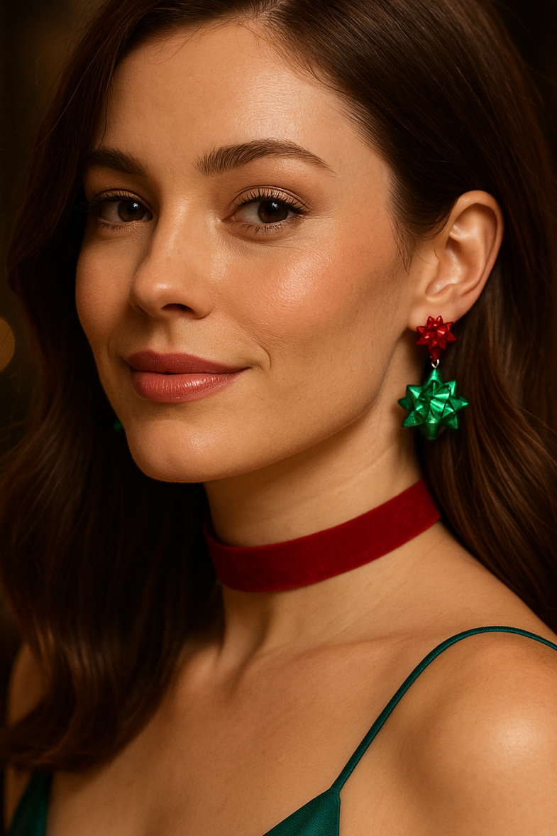Woman wearing festive earrings with a blurred background