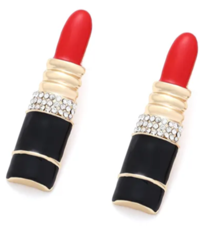 Lipstick-shaped earrings with red caps, black bodies, and decorative elements on a white background