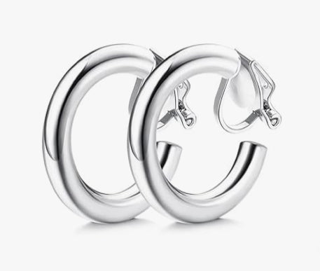 Pair of silver hoop earrings on a white background