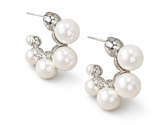 Pair of pearl earrings on a white background
