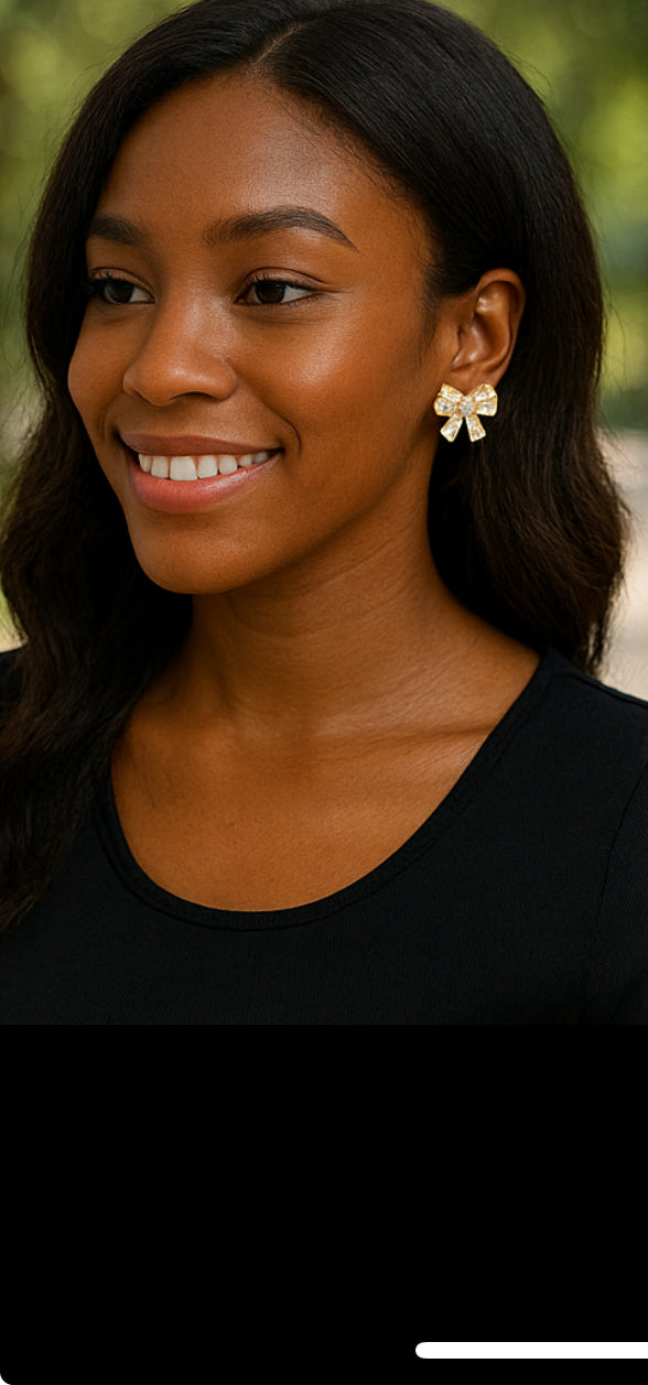 Woman wearing a black top with a blurred background