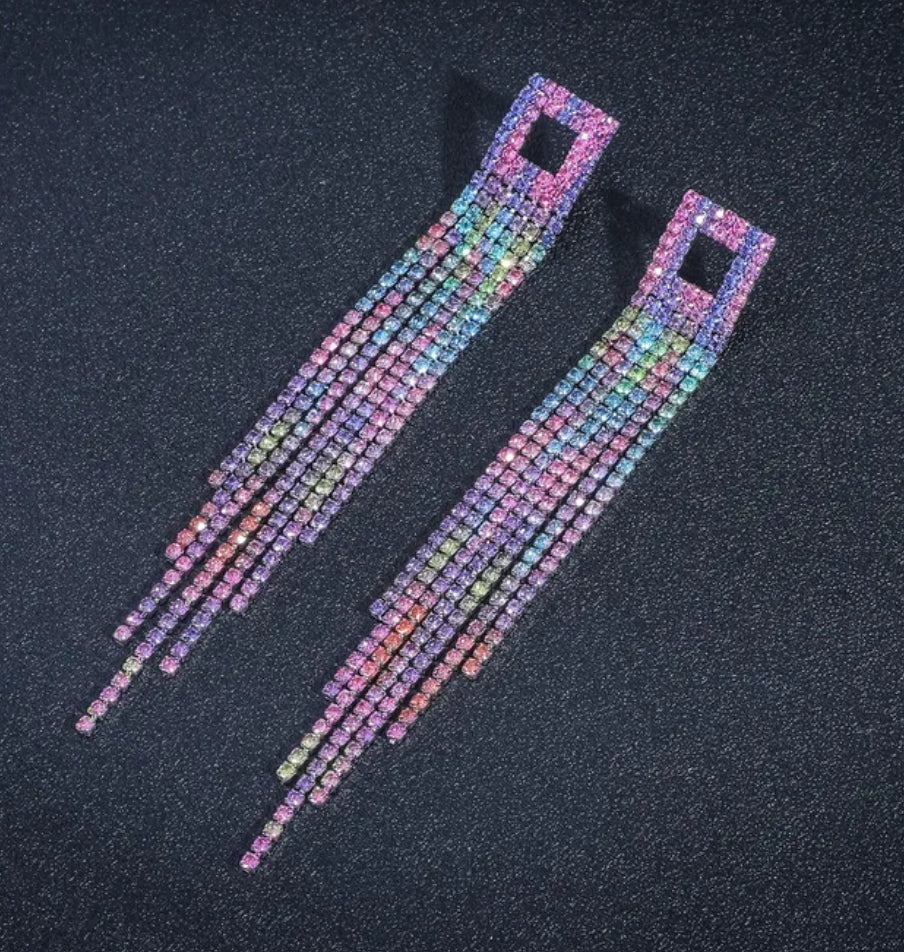 Two colorful beaded straps on a dark background