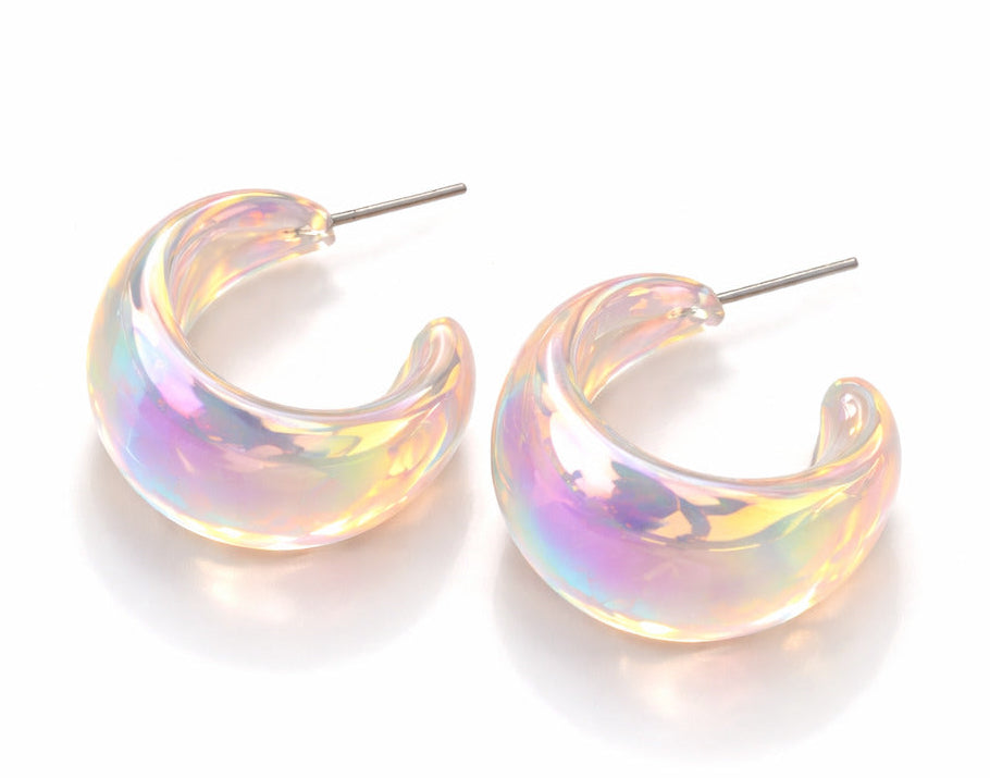 Iridescent hoop earrings on a white background