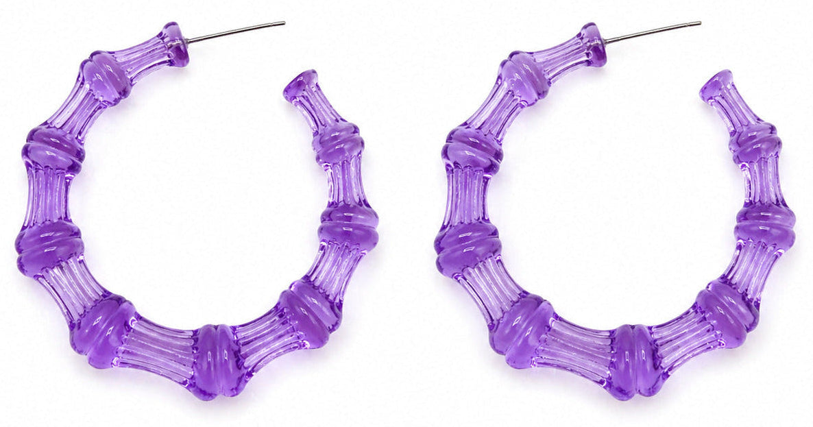 Purple hoop earrings on a white background