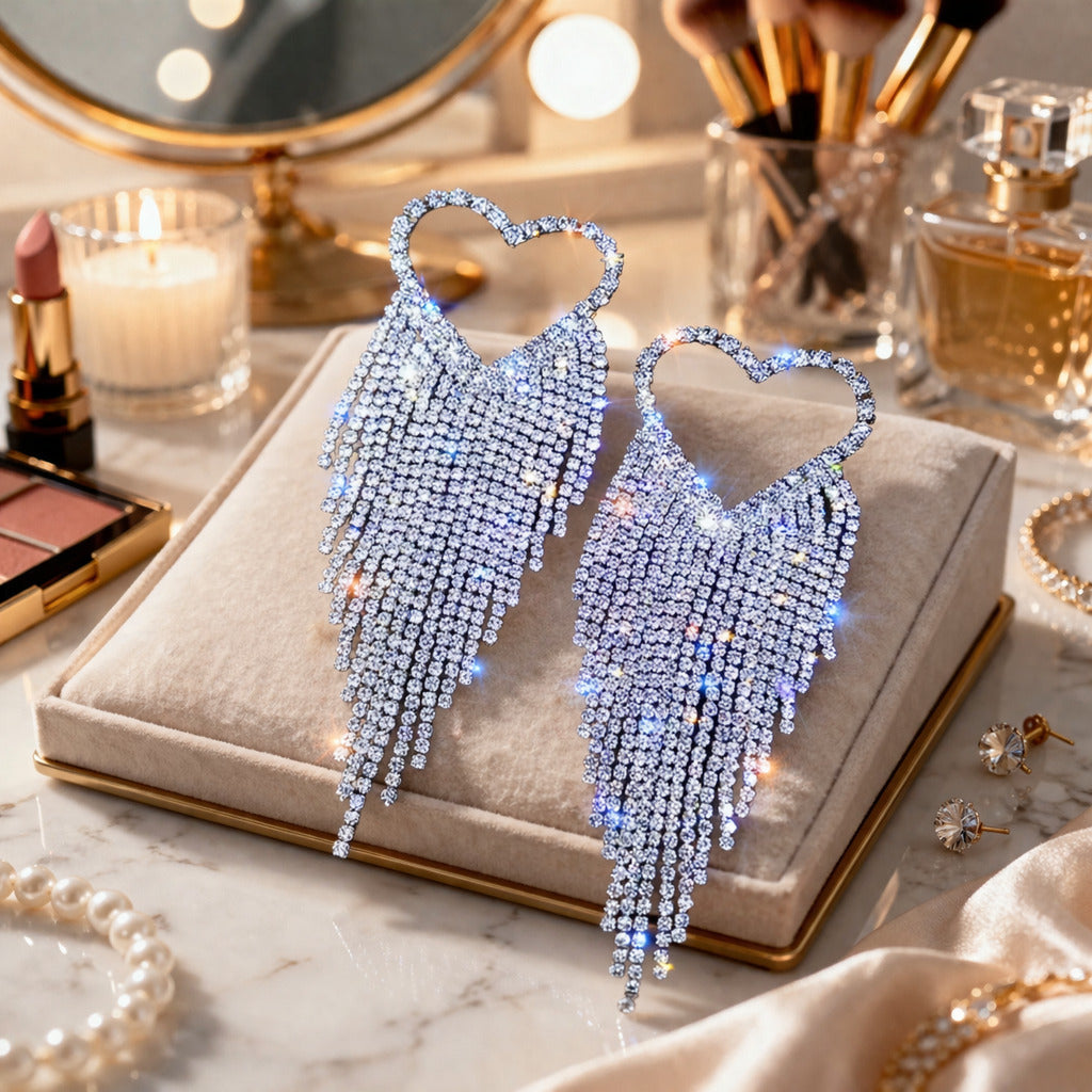 Luxury diamond earrings on a jewelry display box with makeup and perfume in the background