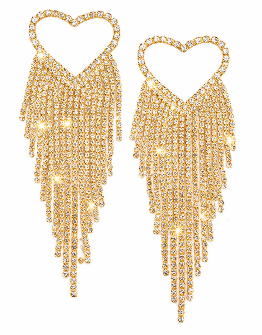 Gold heart-shaped earrings with fringe details on a white background