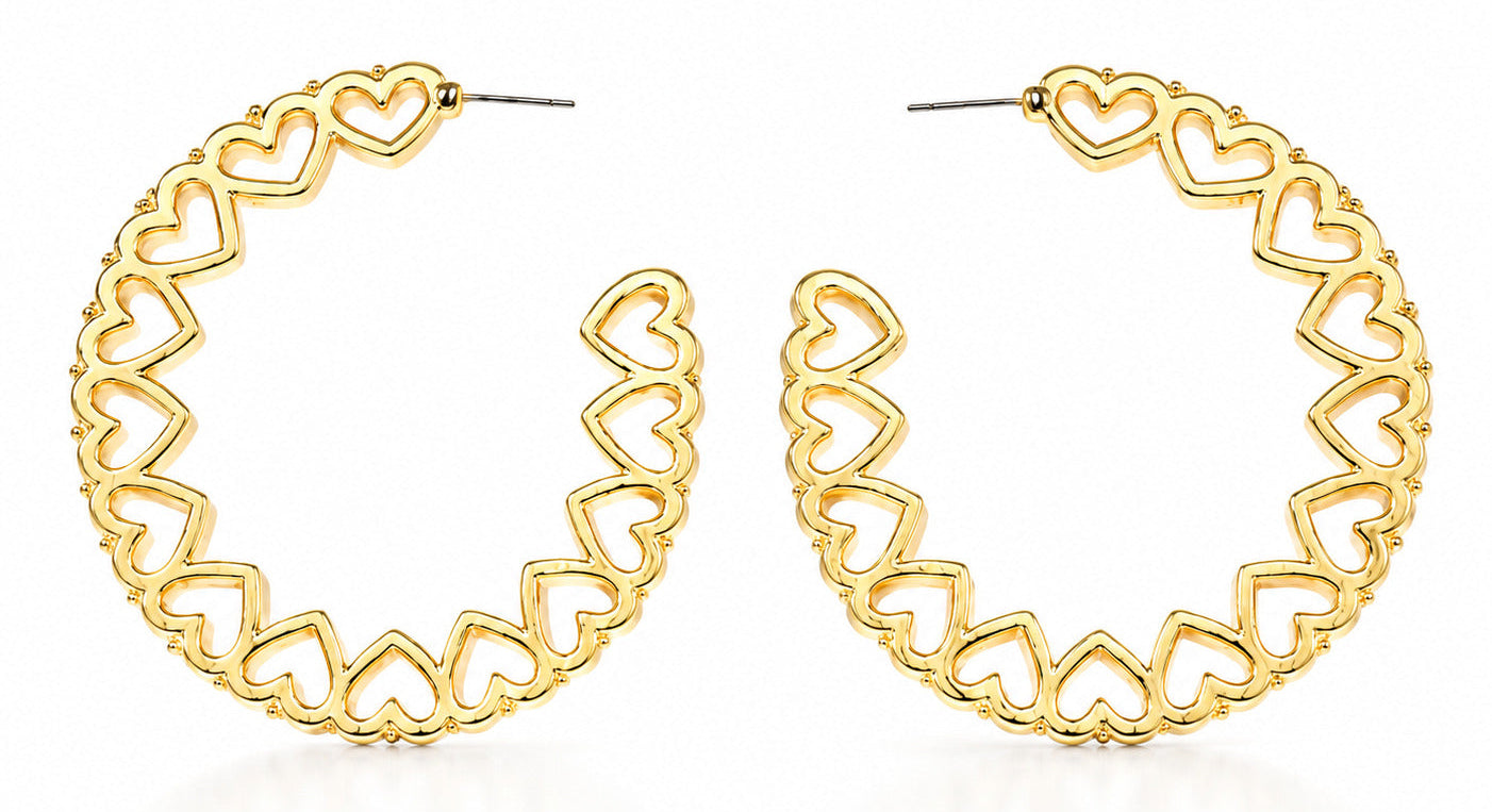 A pair of gold hoop earrings with an openwork design of interlocking hearts, displayed on a clean white background.