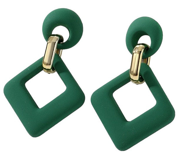 A pair of green velvet rhombus-shaped earrings with gold clip attachments, displayed against a white background.